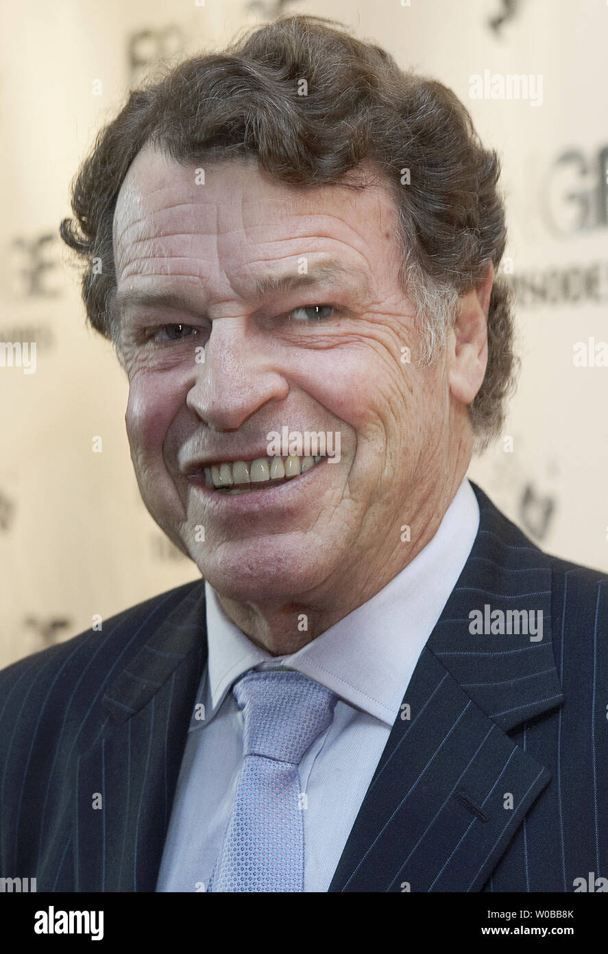 Actor John Noble (as Dr. Walter Bishop) arrives on the red carpet for the 100th Episode Celebration of the Fringe Television Series at the Fairmont Pacific Rim Hotel in Vancouver, British Columbia, December 1, 2012.    UPI Photo /Heinz Ruckemann Stock Photo