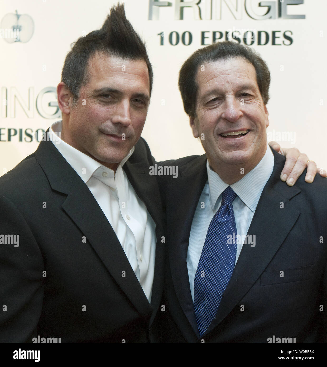 Peter Roth Producer Executive Producer J. H. Wyman (L) greets Peter Roth, President of ...