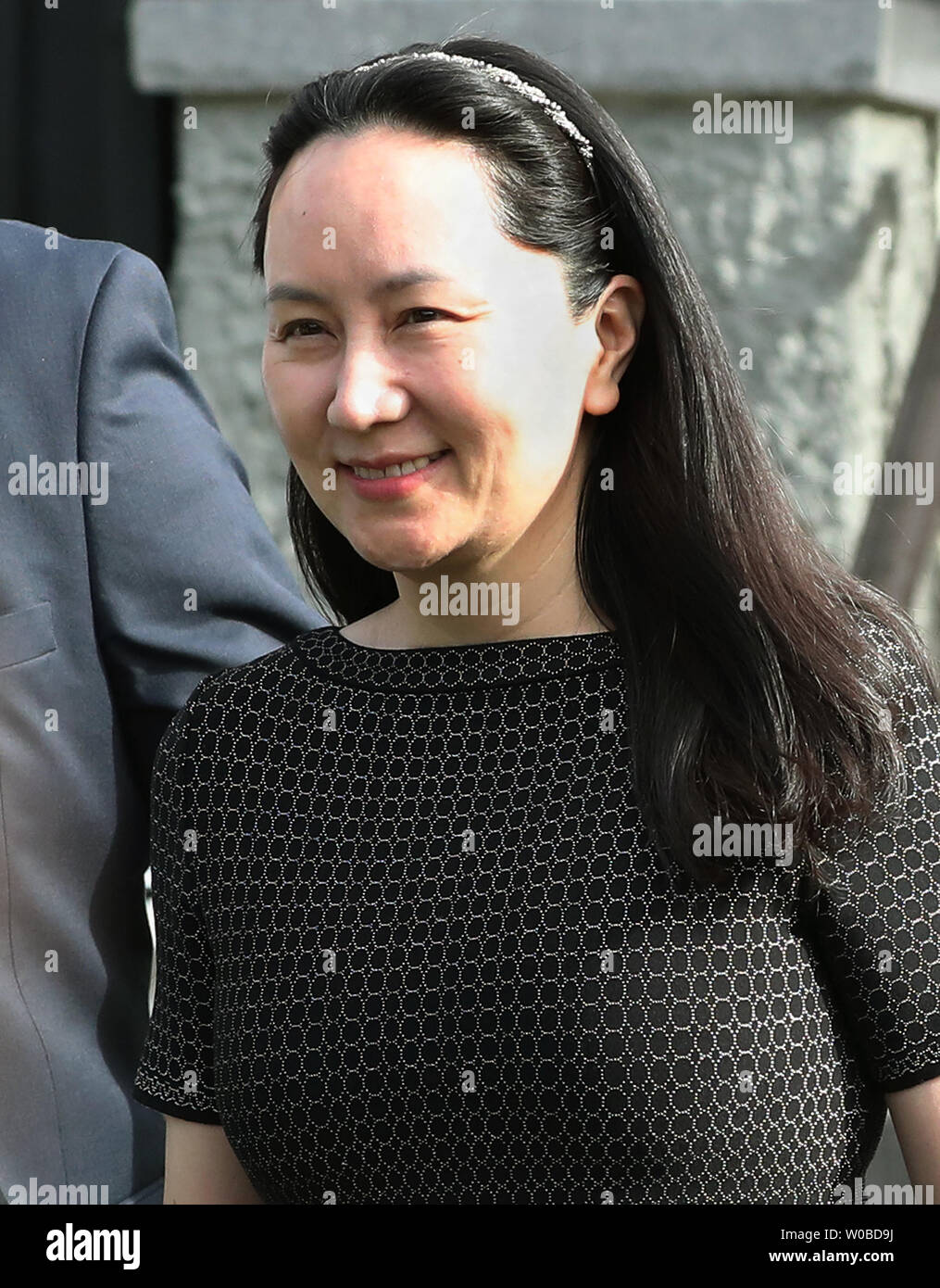 Huawei CFO Meng Wanzhou wearing a GPS tracker and ankle bracelet is