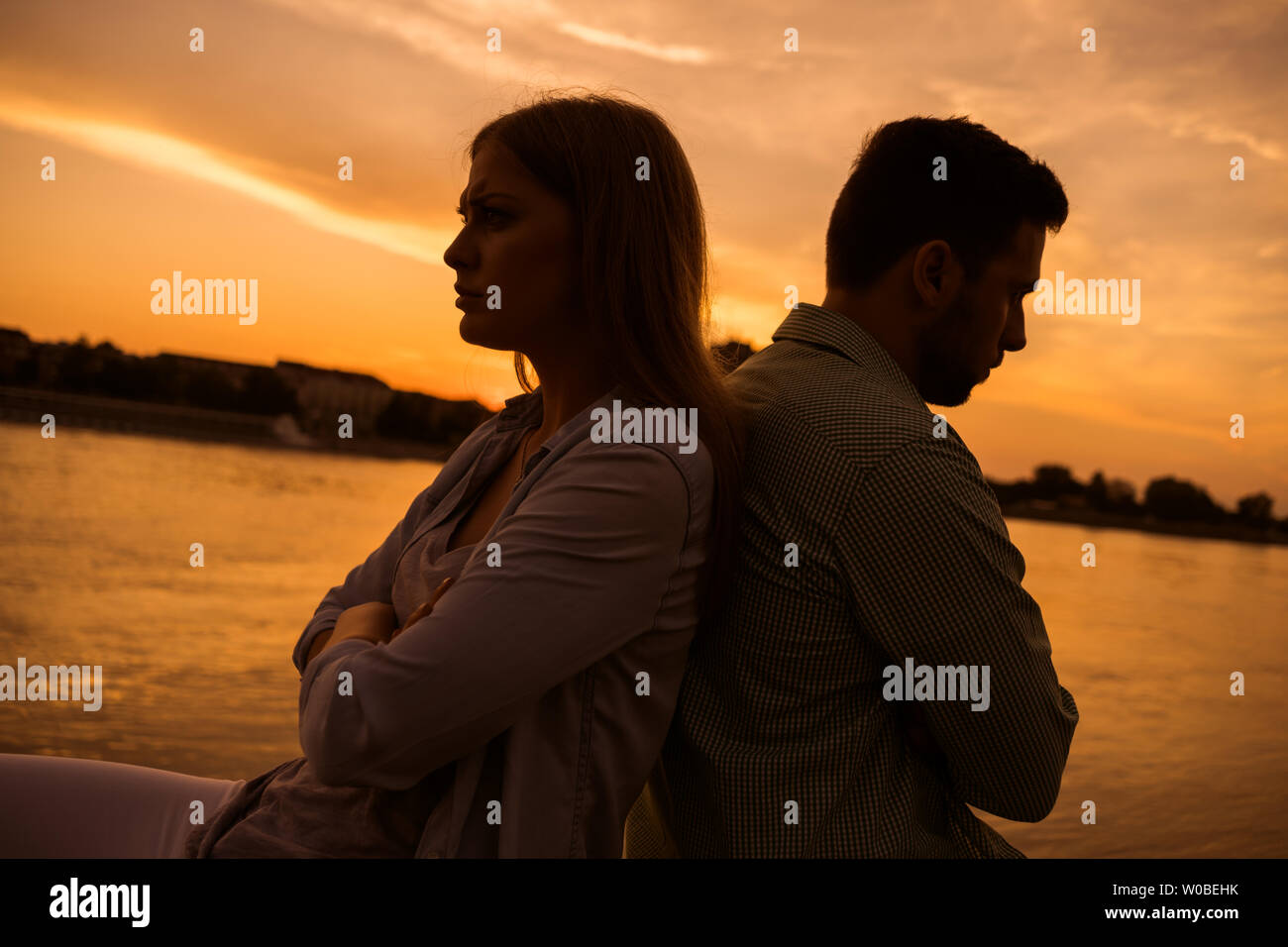 Young couple having troubles in their relationship. Stock Photo