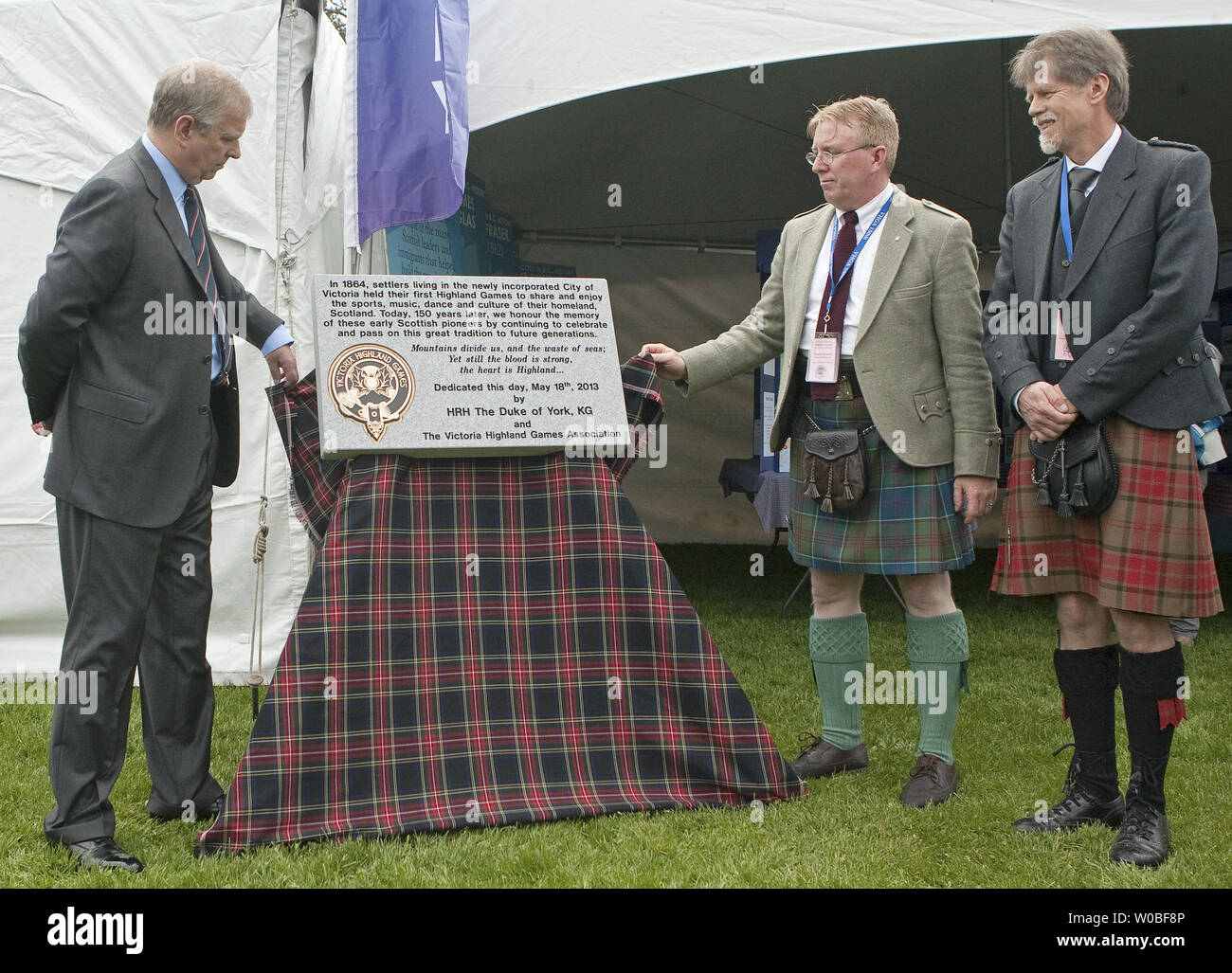 The Guest Of The Victoria Highland Games Association And Designated Chief Of The Games Prince Andrew Along With Association President Jim Maxwell Right And Board Member Randy Stewart Unveil A Plaque During