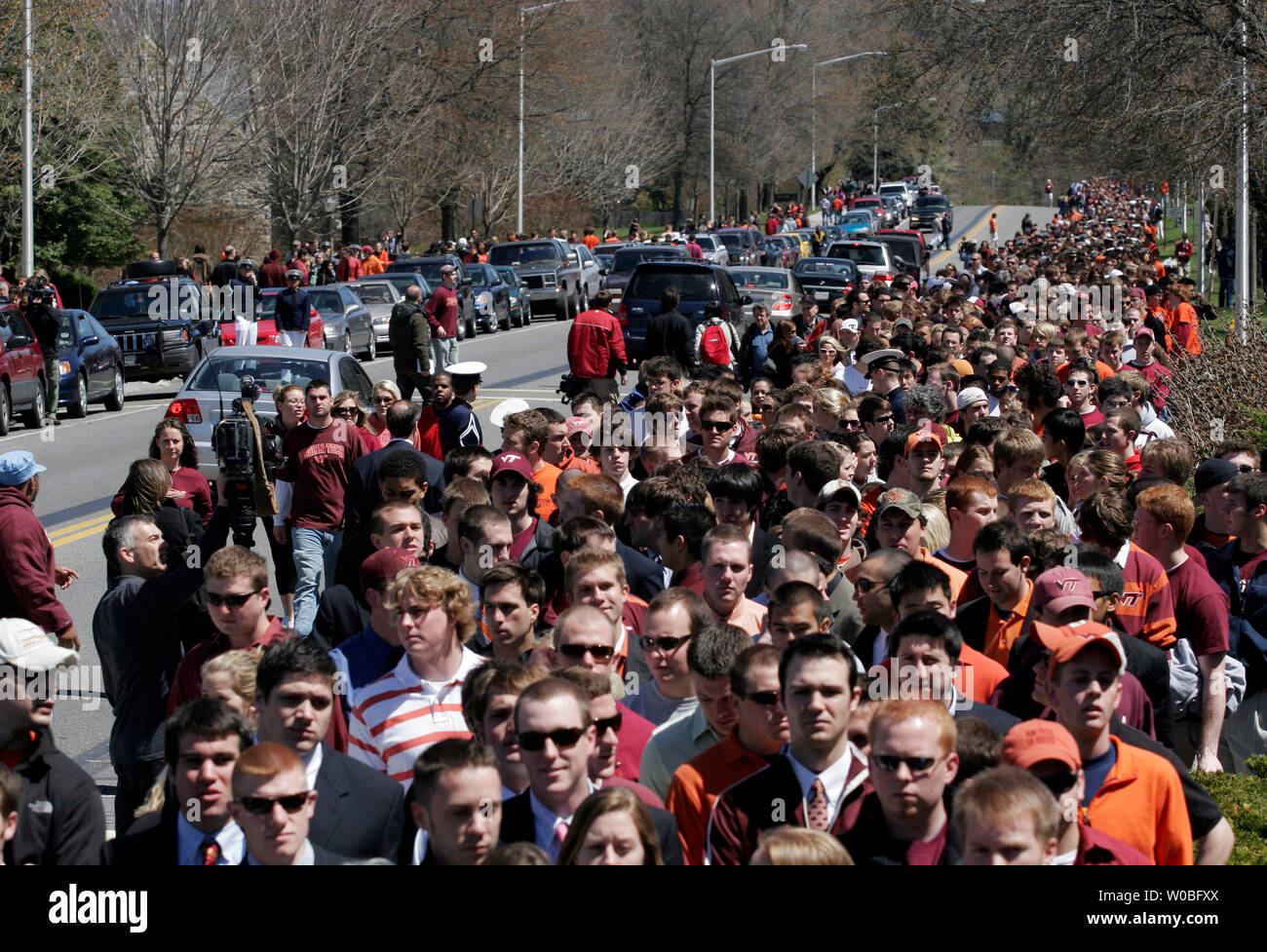 Virginia Tech students line up outside Cassell Coliseum prior to a convocation in memory of the 33 people who died the day before in two shooting incidents on campus in Blacksburg, Virginia, April 17, 2007. The shooting is the deadliest on a school campus in U.S. history. (UPI Photo/Saul Loeb) Stock Photo