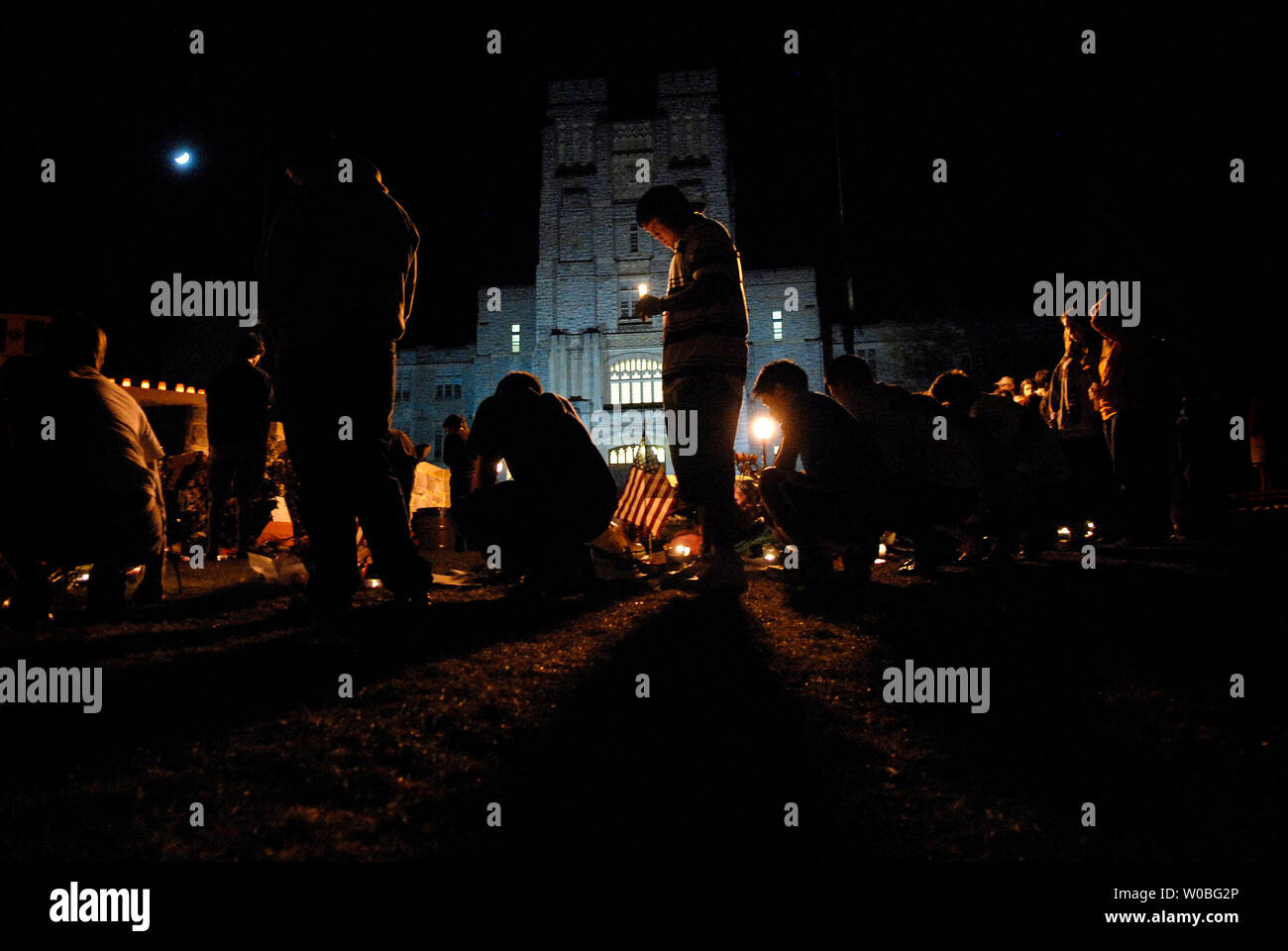 Visitors pay their respects to the 32 victims of last Mondays shooting at a memorial in front of Burruss Hall, on the campus of Virginia Tech in Blacksburg, Virginia on April 22, 2007. Cho Seung-Hui, a student at Virginia Tech, went on a shooting spree and killed 32 people on April 16, 2007. It was the deadliest school shooting in U.S. history. (UPI Photo/Kevin Dietsch) Stock Photo