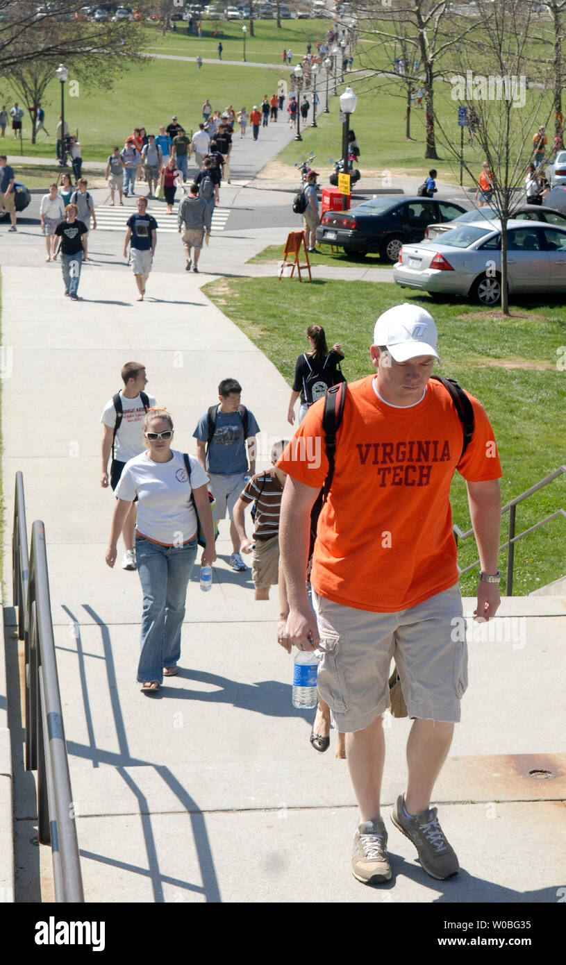 Virginia Tech students make their way across Drill Field, on the campus of Virginia Tech in Blacksburg, Virginia on April 23, 2007. Today was the first day of classes since Cho Seung-Hui, a student at Virginia Tech, went on a shooting spree and killed 32 people on April 16, 2007. (UPI Photo/Kevin Dietsch) Stock Photo