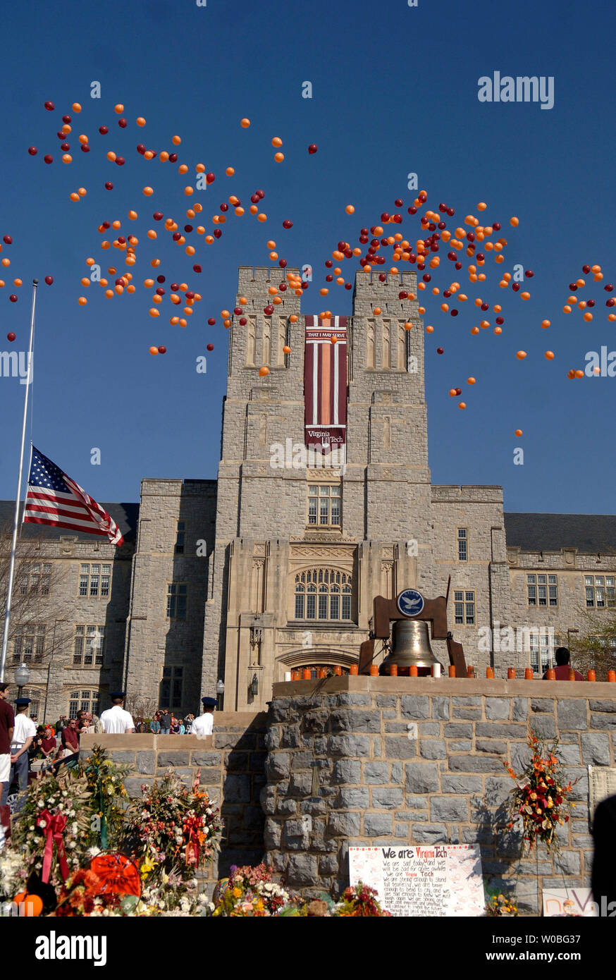 Balloons are released in front of Burruss Hall during a ceremony for the 32 victims of last Mondays shooting, on the campus of Virginia Tech in Blacksburg, Virginia on April 23, 2007. Cho Seung-Hui, a student at Virginia Tech, went on a shooting spree and killed 32 people on April 16, 2007. Today was the first day of classes since the shooting. (UPI Photo/Kevin Dietsch) Stock Photo