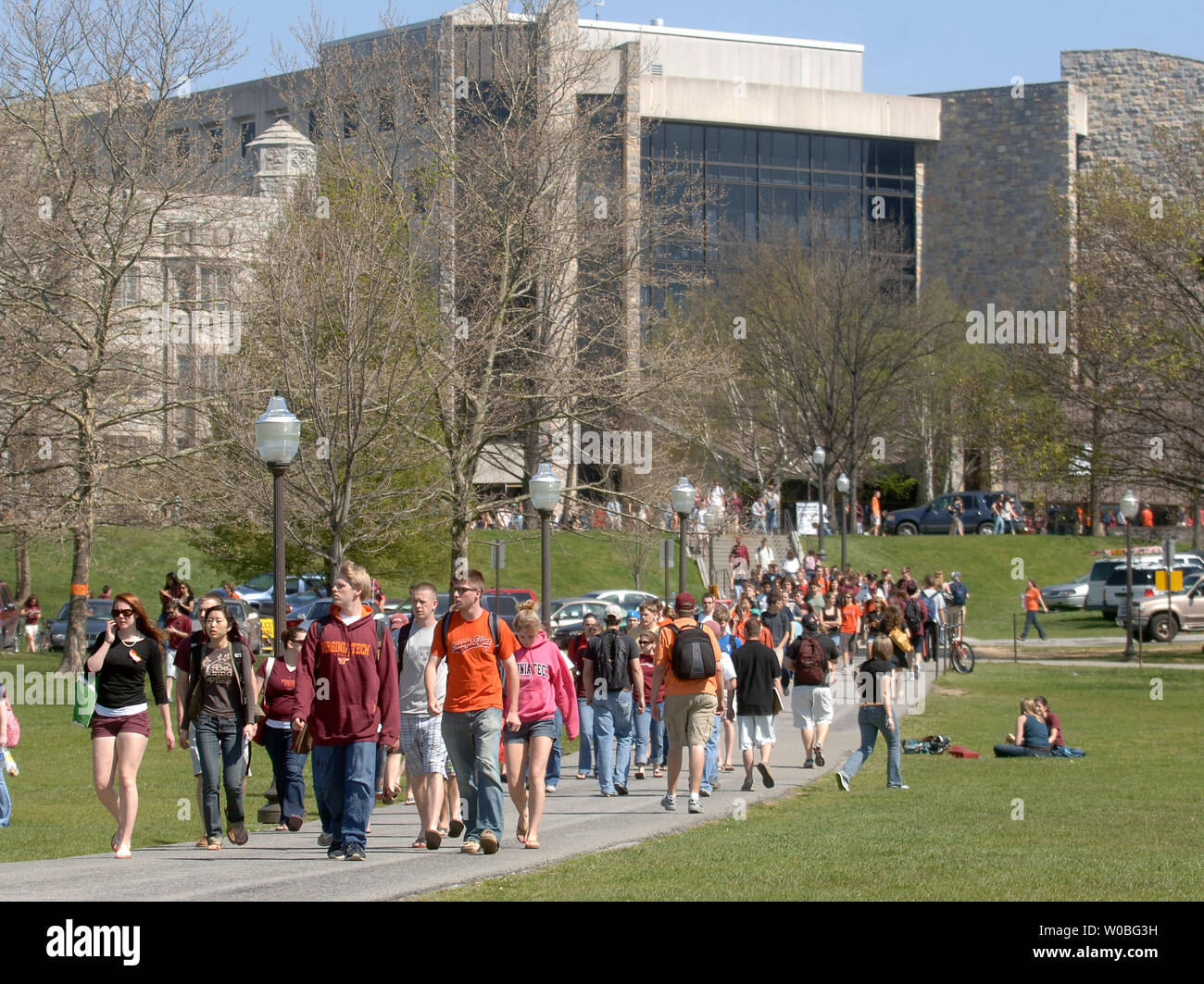 Virginia Tech students make their way across Drill Field, on the campus of Virginia Tech in Blacksburg, Virginia on April 23, 2007. Today was the first day of classes since Cho Seung-Hui, a student at Virginia Tech, went on a shooting spree and killed 32 people on April 16, 2007. (UPI Photo/Kevin Dietsch) Stock Photo