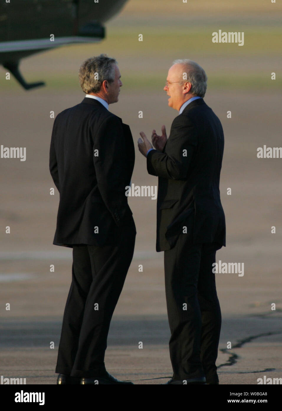 President George W. Bush arrives in Waco, Texas to spend the Father's Day weekend at his ranch in Crawford, Texas on June 16, 2006. The President and his senior adviser Carl Rove discuss issues while waiting for the arrival of First Lady Laura Bush. (UPI Photo/Ron Russek II) Stock Photo