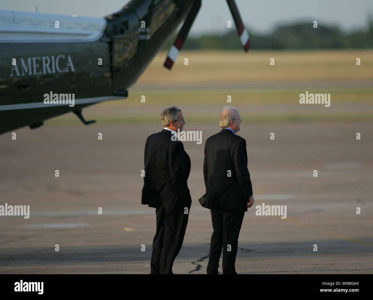 President George W. Bush arrives in Waco, Texas to spend the Father's Day weekend at his ranch in Crawford, Texas on June 16, 2006. President Bush and senior adviser Carl Rove await the arrival of First Lady Laura Bush. (UPI Photo/Ron Russek II) Stock Photo