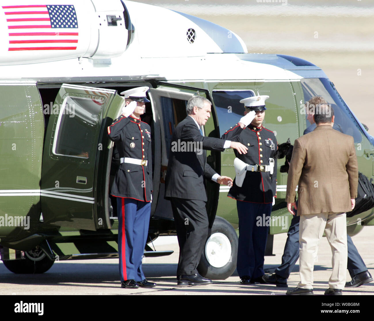 spike/kd   President George W. Bush arrives at the TSTC airport in Waco, Texas on December 26, 2006. The President accompanied by First Lady Laura Bush and her mother Jenna Welsh intend to spend the holiday's at his ranch in Crawford, Texas. (UPI Photo/Ron Russek II) Stock Photo