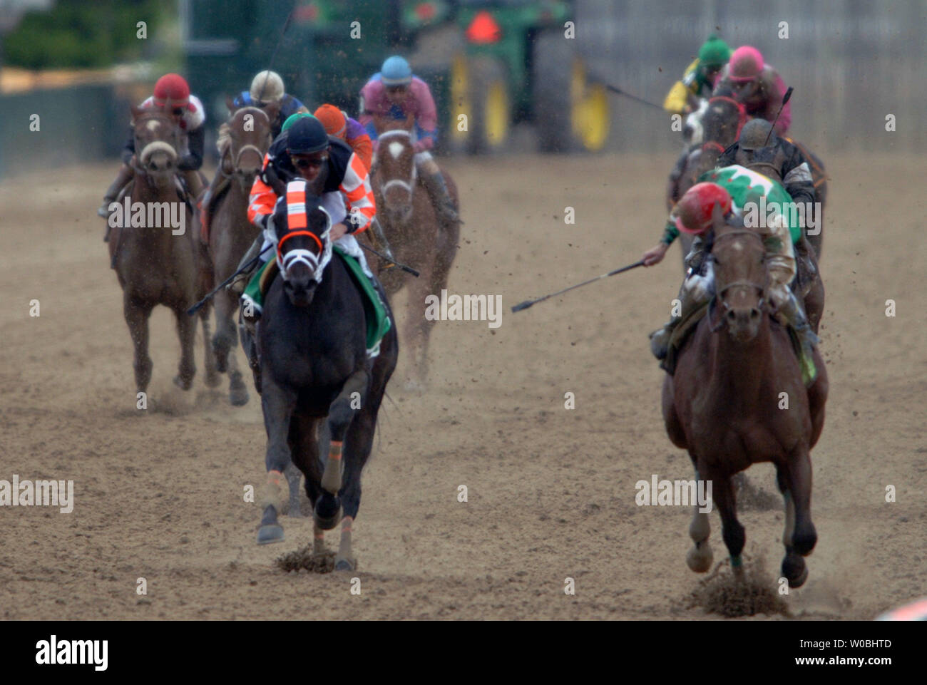 Jockey Jeremy Rose aboard Alex Afleet (R)  looks back on Scrappy T in the 130th running of the Preakness Stakes on May 21, 2005 at the Pimlico Race Course in Baltimore, MD. Afleet Alex won the race after nearly falling in the homestretch.  (UPI Photo/Mark Goldman) Stock Photo