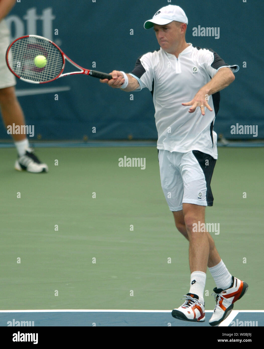 Kevin Ullyett returns a serve in the second set against Mike and Bob Bryan  during the mens doubles final of the Legg Mason Tennis Classic at the  William H.G. Fitzgerald Tennis Center