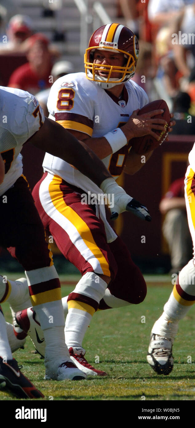 Quarterback Patrick Ramsey of the Washington Redskins is sacked late in the  fourth quarter by Sam Rayburn and Jevon Kearse (93) of the Philadelphia  Eagles in the Redskins 17-14 loss to the