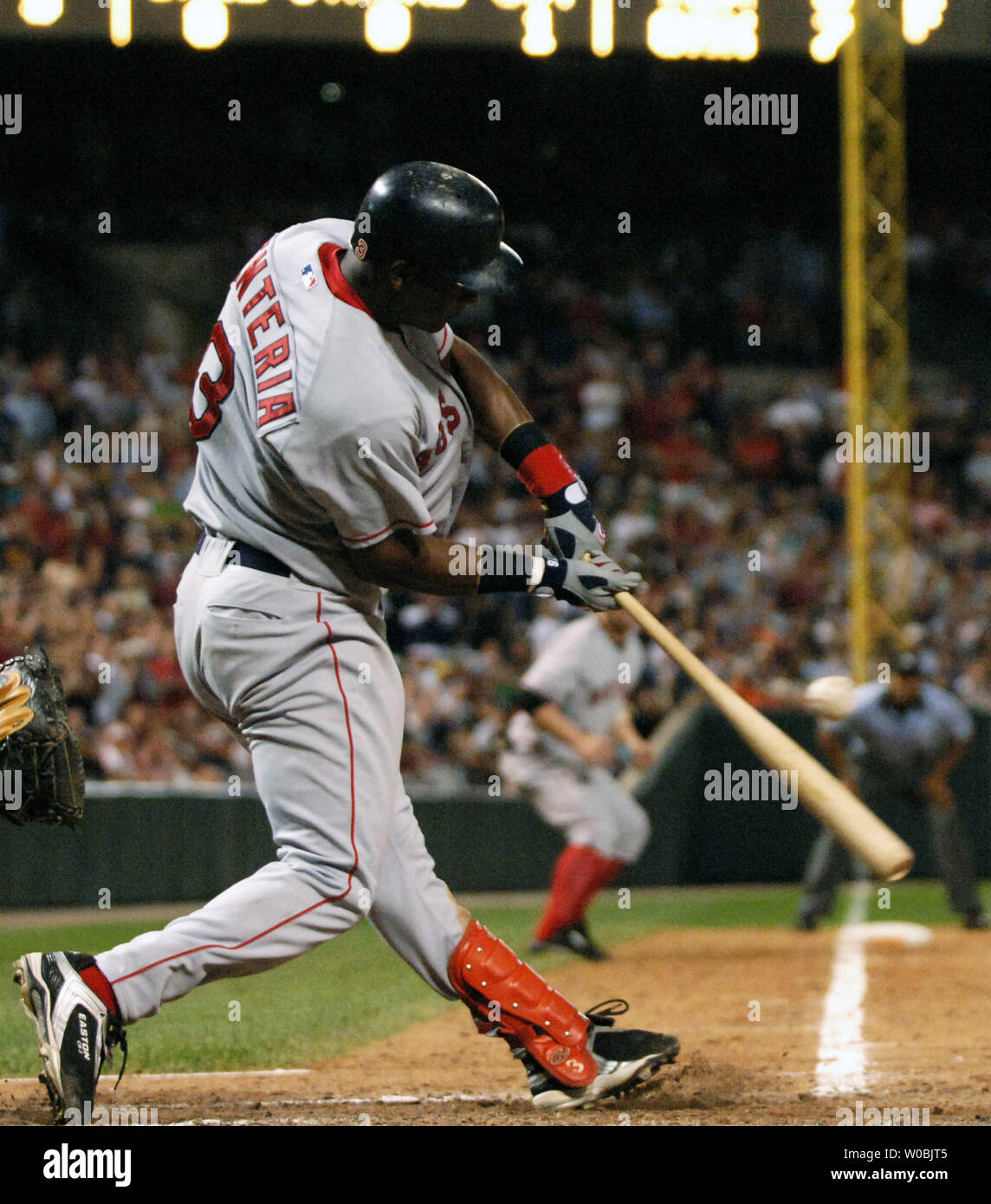The Boston Red Sox Edgar Renteria hits a two run single scoring Adam Castro and Trot Nixon with the game winning runs in the ninth inning against the Baltimore Orioles B.J. Ryan on September 24, 2005 at Orioles Park at Camden Yards in Baltimore, MD.  The Red Sox defeated the Orioles 4-3.  (UPI Photo/Mark Goldman) Stock Photo
