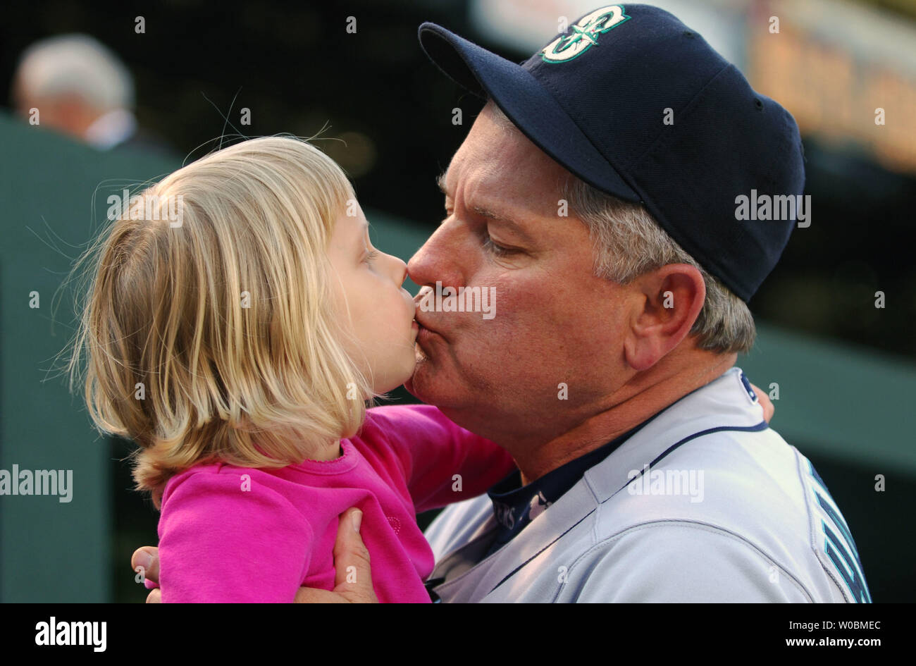 The Seattle Mariners manager Mike Hargrove kisses his ...
