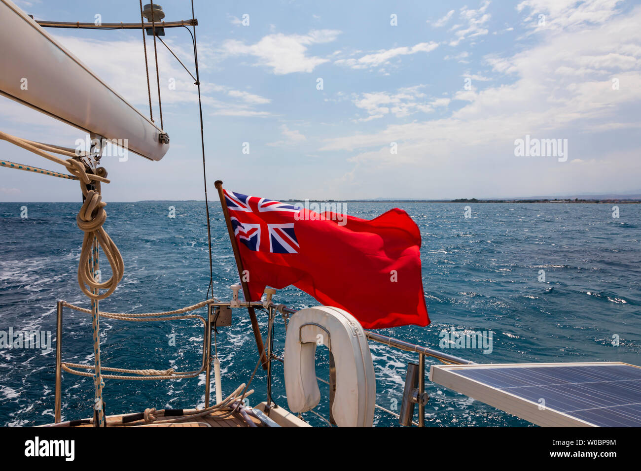 Sailing aboard a yacht in the Mediterranean Sea off the coast of Larnaca, Cyprus. Stock Photo