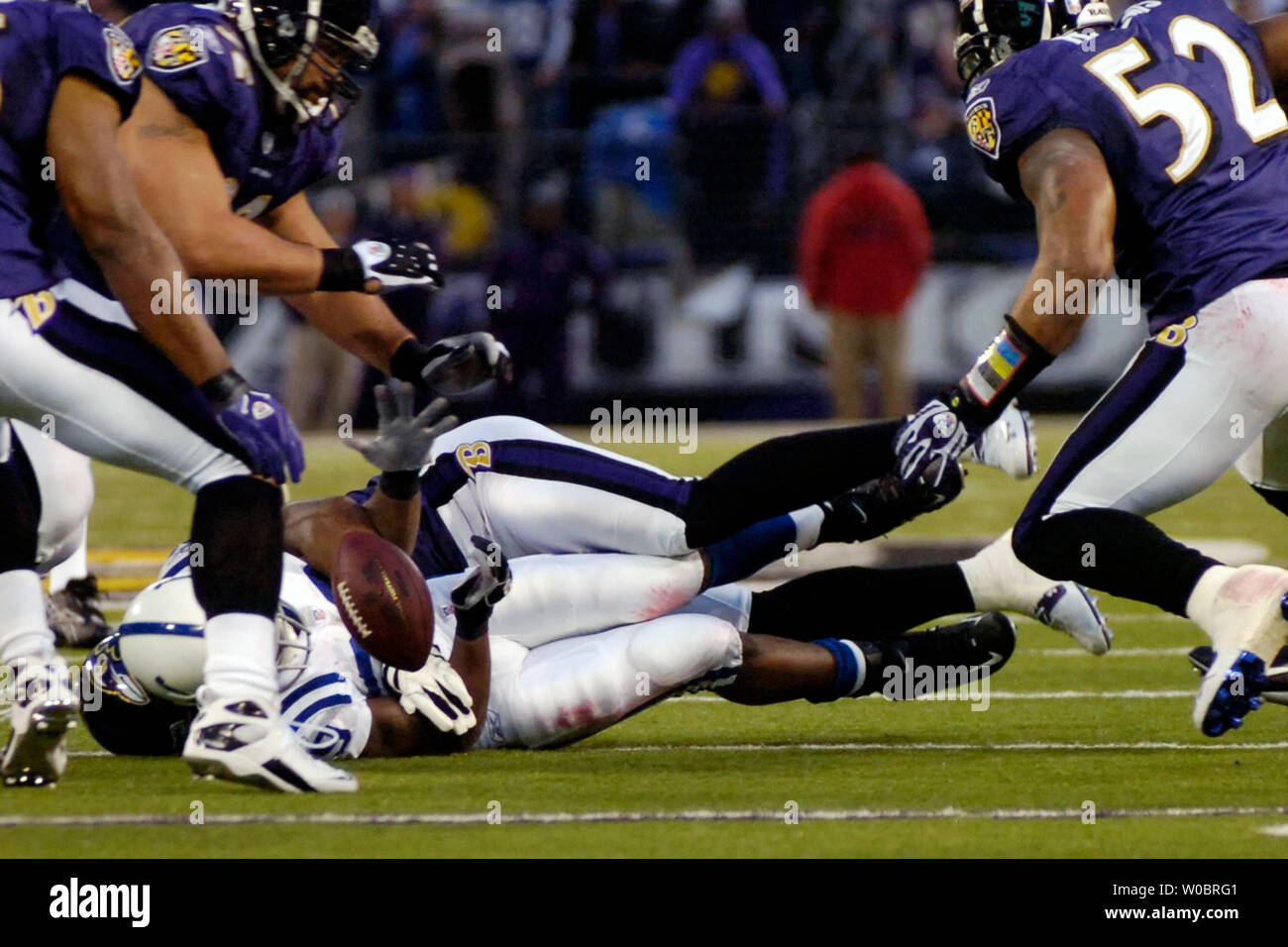 The Indianapolis Colts running back Joseph Addai (29) fumbles the ball in the third quarter against the Baltimore Ravens on January 13, 2007 in the divisional round of the AFC playoffs at M&T Bank Stadium in Baltimore, Maryland.  Indianapolis Colts wide receiver Aaron Moorehead recovered the ball as the Colts defeated the Ravens 15-6 to advance to the AFC championship game.  (UPI Photo/ Mark Goldman) Stock Photo
