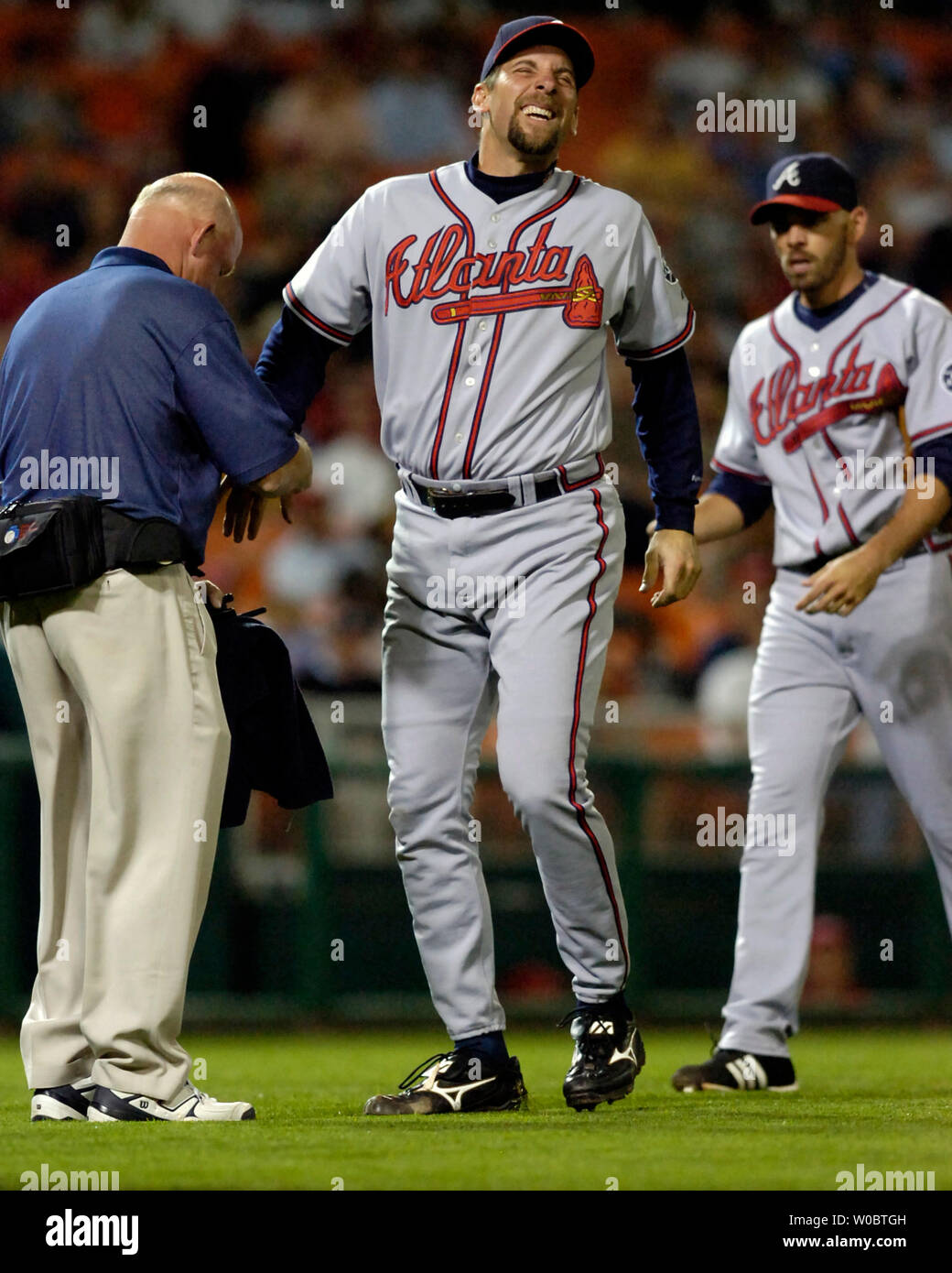 Atlanta Braves pitcher John Smoltz (C) reacts after dislocating his right pinky finger in the seventh inning against the Washington Nationals on May 14, 2007 at RFK Stadium in Washington.  The Nationals defeated the Braves 2-1 on Jason Bergmann's two-hitter.  (UPI Photo/Daniel Goldman) Stock Photo