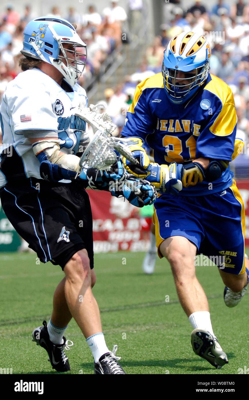 Johns Hopkins University Blue Jays Kevin Huntle (24) works to the net in the first quarter against the Delaware Blue Hens Bo Carrington (31) in the semi-final of the NCAA Division I lacrosse championship at M&T Bank Stadium in Baltimore, Maryland on May 26, 2007.  (UPI Photo/ Mark Goldman) Stock Photo