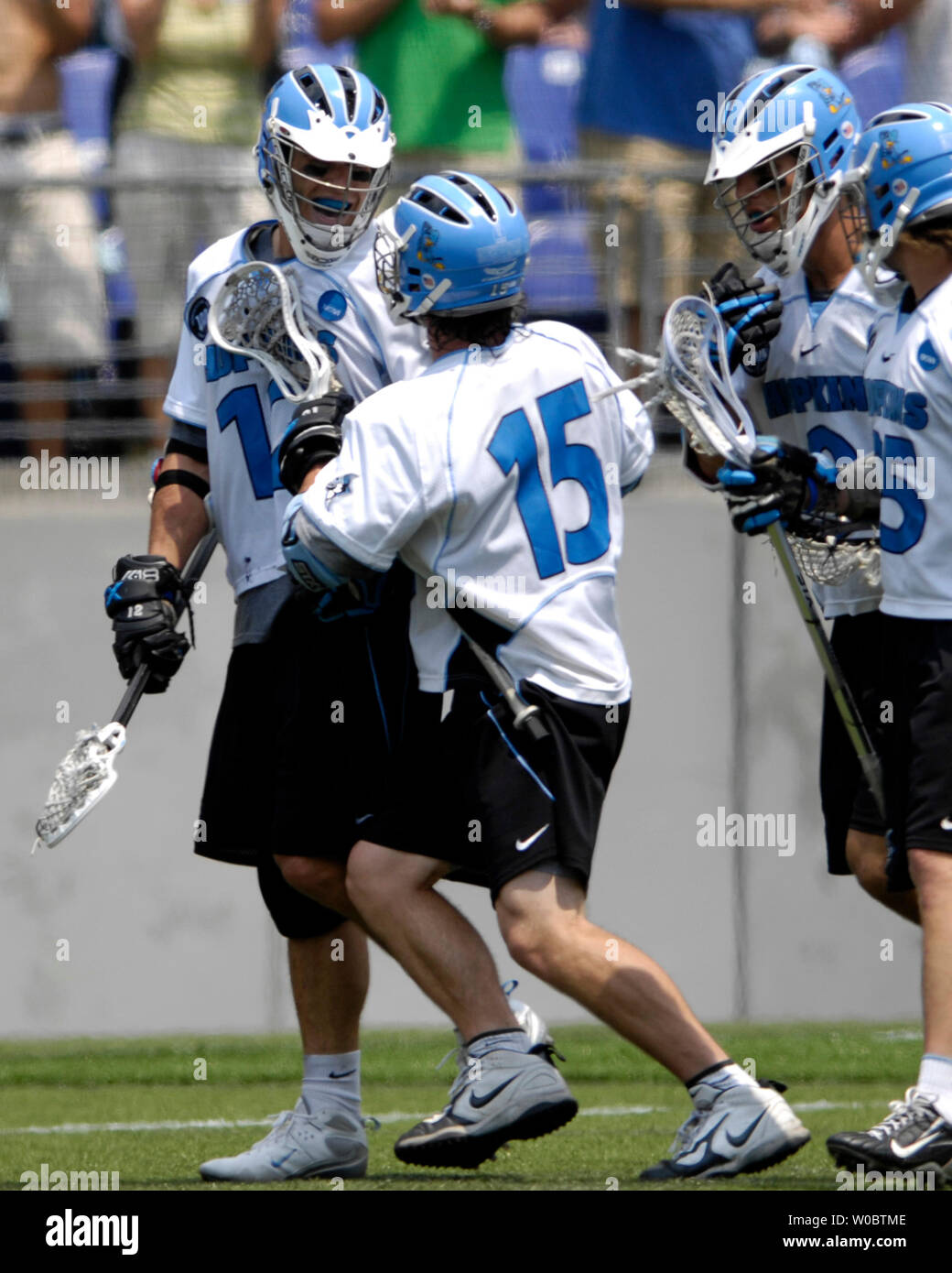 Johns Hopkins University Blue Jays Stephen Peyser (l) is congratulated by Michael Kimmel (15) after scoring a goal in the fourth quarter against the Delaware Blue Hens in the semi-final of the NCAA Division I lacrosse championship at M&T Bank Stadium in Baltimore, Maryland on May 26, 2007.   Johns Hopkins defeated Delaware 8-3 to move to the lacrosse championship.   (UPI Photo/ Mark Goldman) Stock Photo