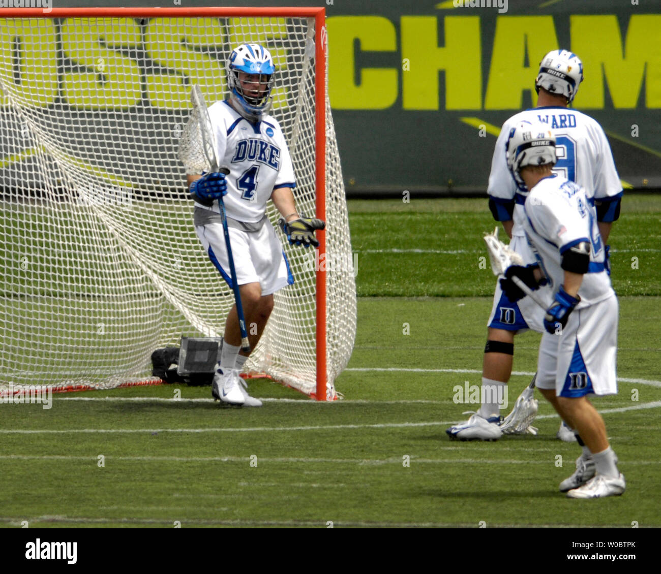 Duke University goalie Dan Loftus (4) talks with mid fielder Steve Schoeffel (20) and mid fielder Michael Ward (9) after giving up a goal in the second quarter against the Johns Hopkins University Blue Jays in the NCAA Division I Lacrosse Championship at M&T Bank Stadium in Baltimore, Maryland on May 28, 2007.  Johns Hopkins defeated Duke to win the NCAA lacrosse championship 12-11.  (UPI Photo/ Mark Goldman) Stock Photo