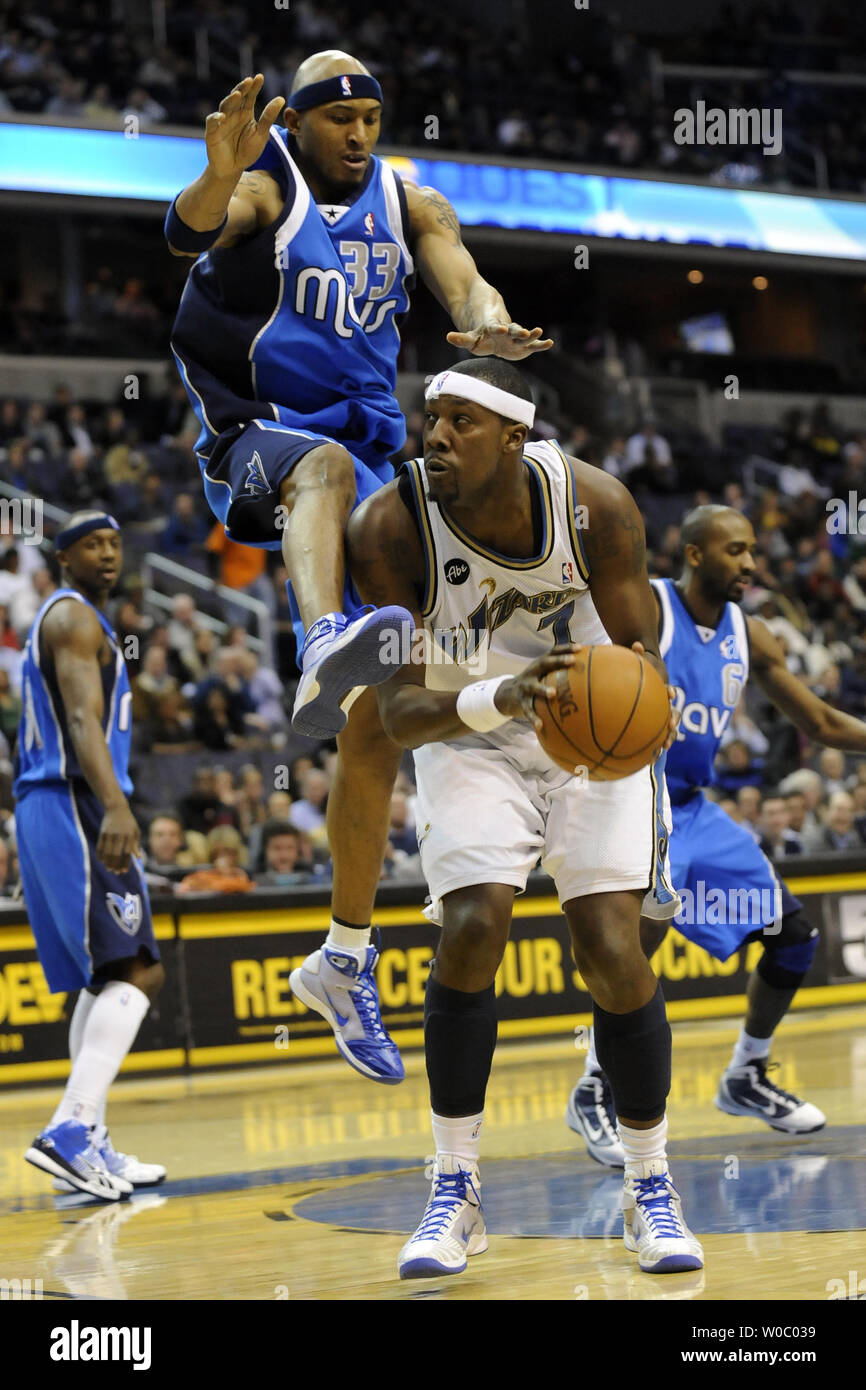 Washington Wizards Forward Andray Blatche 7 Is Defended By Dallas Mavericks Forward James Singleton 33 In The 2nd Quarter At Verizon Center In Washington D C On January 20 2010 Upi Mark Goldman Stock Photo Alamy