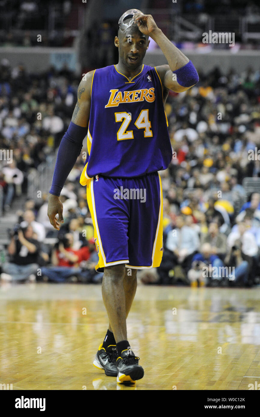 Kobe Bryant of the Los Angeles Lakers walks up court against the
