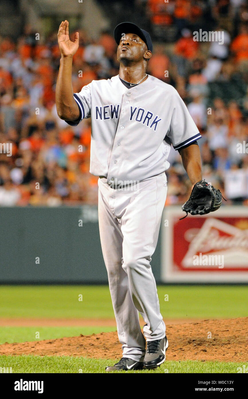 New York Yankees relief pitcher Rafael Soriano (29) points skyward after  pitching against the Baltimore Orioles in the 9th inning at Orioles Park at  Camden Yards in Baltimore, Md. on September 7