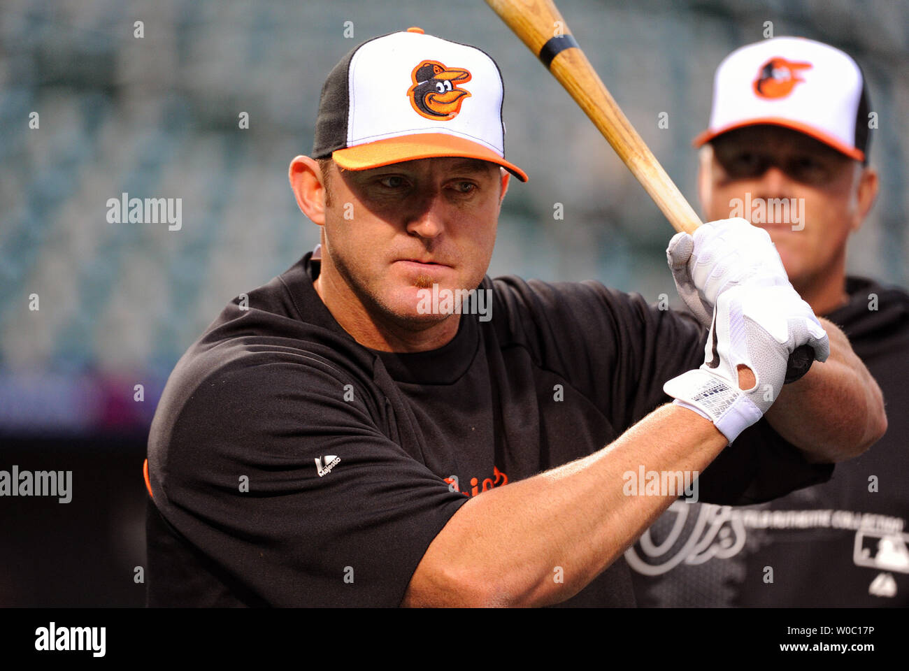 Baltimore Orioles designated hitter Jim Thome (25) warms up at