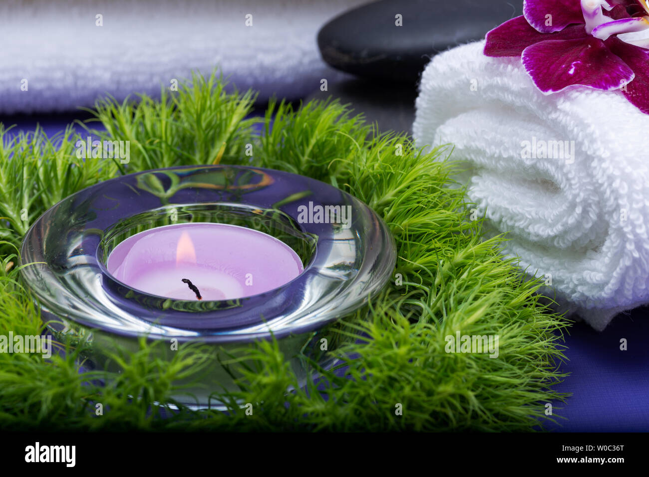 Wellness Relax concept with Spa elements. White Towels, Basalt Stones