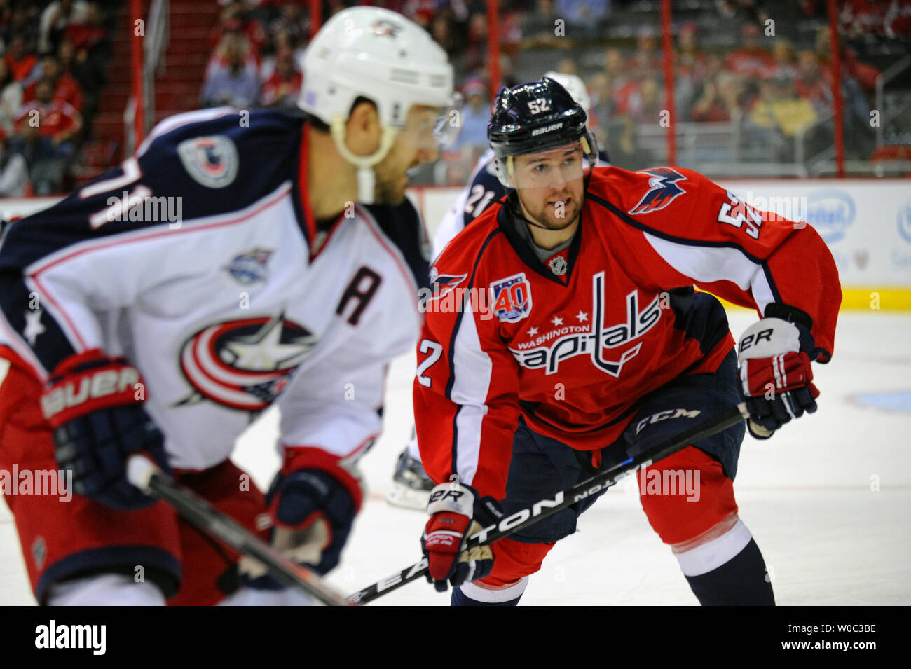 Columbus Blue Jackets defenseman Nick Blankenburg, left, controls the puck  behind Toronto Maple Leafs defenseman Justin Holl during an NHL hockey game  in Columbus, Ohio, Friday, Feb. 10, 2023. The Maple Leafs