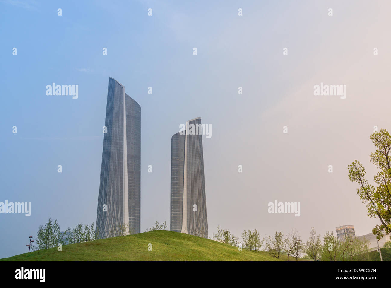 Landside lawns and landmark buildings under sunset in Nanjing Stock Photo