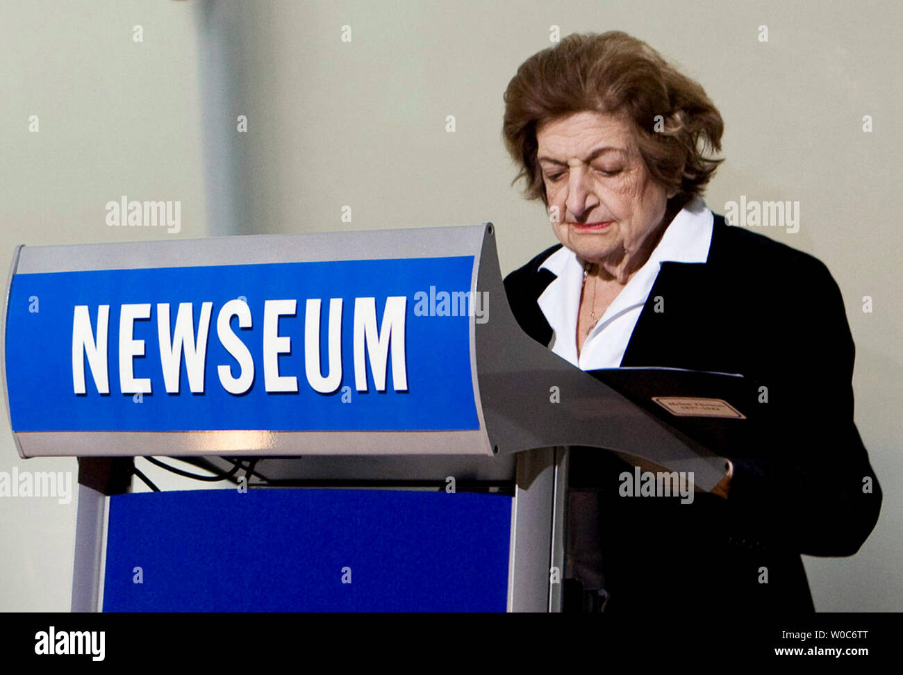 Helen Thomas of Hearst News Service speaks at the dedication of the Journalists Memorial that honors journalists who died or were killed in the pursuit of news at The Newseum on April 4, 2008 in Washington.  The Journalists Memorial bears the names of 1,843 reporters, editors, photographers, broadcasters and executives from around the world who died or were killed while covering wars, civil violence or natural disasters, or were killed because of their work since 1837.  (UPI Photo/Patrick D. McDermott) Stock Photo