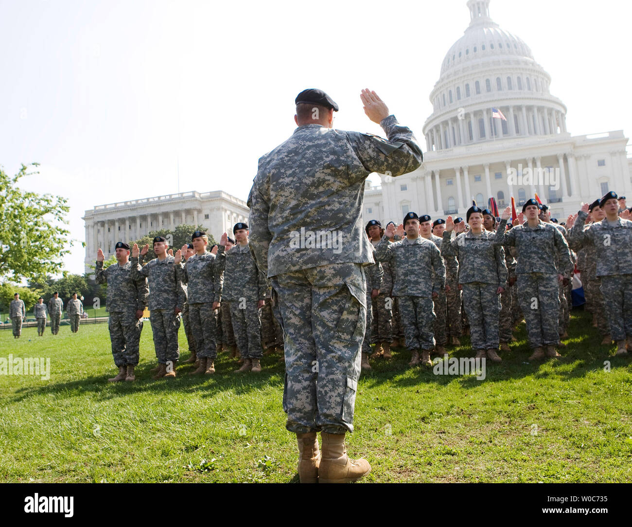 Army Reserve Chief Lt. Gen. Jack Stultz leads members of the Army Reserve as they are sworn in during an Army Reserve event to re-enlist 100 Reserve soldiers on the west lawn of the Capitol in Washington on April 23, 2008. The ceremony celebrates the 100th Anniversary of the United States Army Reserve and honors its Soldiers and Veterans who have played a vital role in every major U.S military conflict and humanitarian mission. (UPI Photo/Patrick D. McDermott) Stock Photo