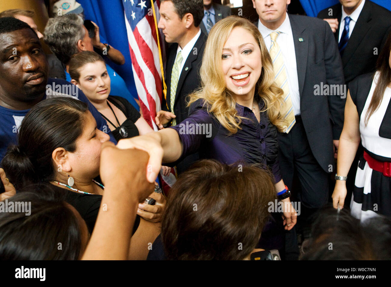 Chelsea Clinton signs autographs at a campaign event at the National ...