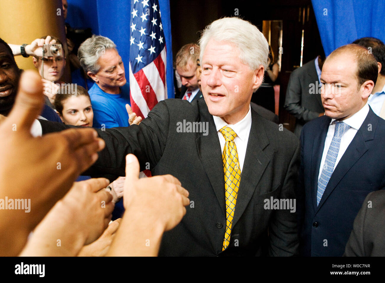 Former President Bill Clinton signs autographs after a campaign event at the National Building Museum in Washington on June 7, 2008. Clinton formally suspended her campaign for president and endorsed Democratic Presidential candidate Sen. Barack Obama, D-IL. (UPI Photo/Patrick D. McDermott) Stock Photo