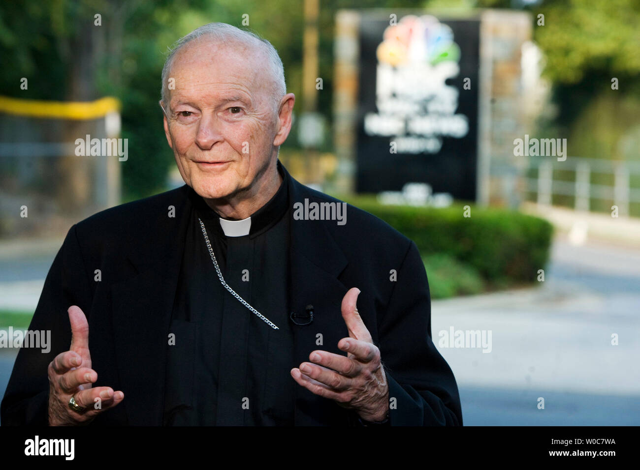 Cardinal Theodore McCarrick, retired Archbishop of Washington, talks at the entrance to NBC Studios in Washington on June 13, 2008. NBC Political Correspondent Tim Russert died of an apparent heart attack while working at this NBC News Bureau in Washington on Friday. Tim Russert was the host of 'Meet the Press,' and NBC's Washington bureau chief. He was 58. (UPI Photo/Patrick D. McDermott) Stock Photo