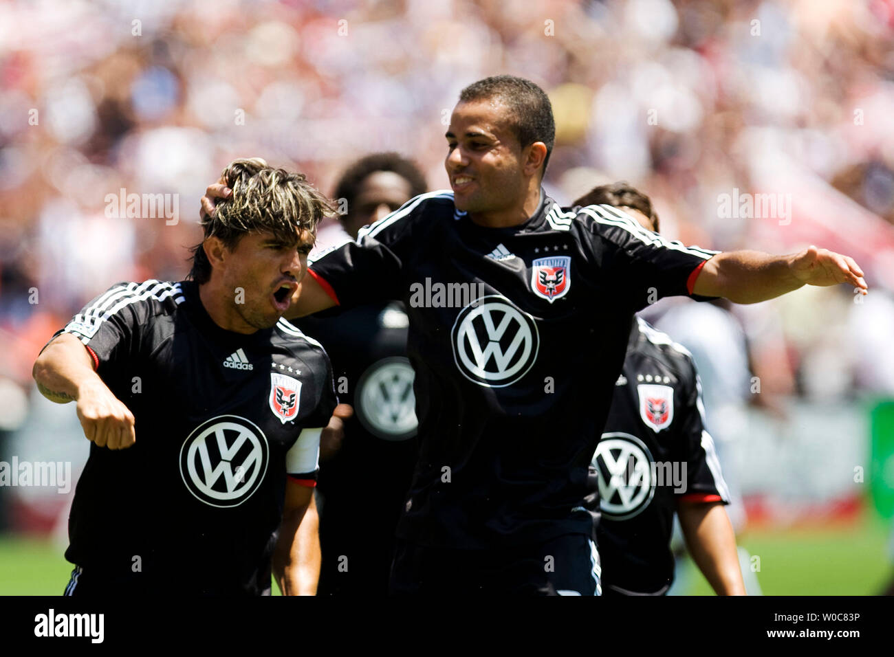 D.C. United's Jaime Moreno (99) celebrates with his teammate Marcelo Gallardo (10) after scoring on a penalty kick during the 5th minute of the 1st half against the Los Angeles Galaxy at RFK Stadium in Washington on June 29, 2008. (UPI Photo/Patrick D. McDermott) Stock Photo