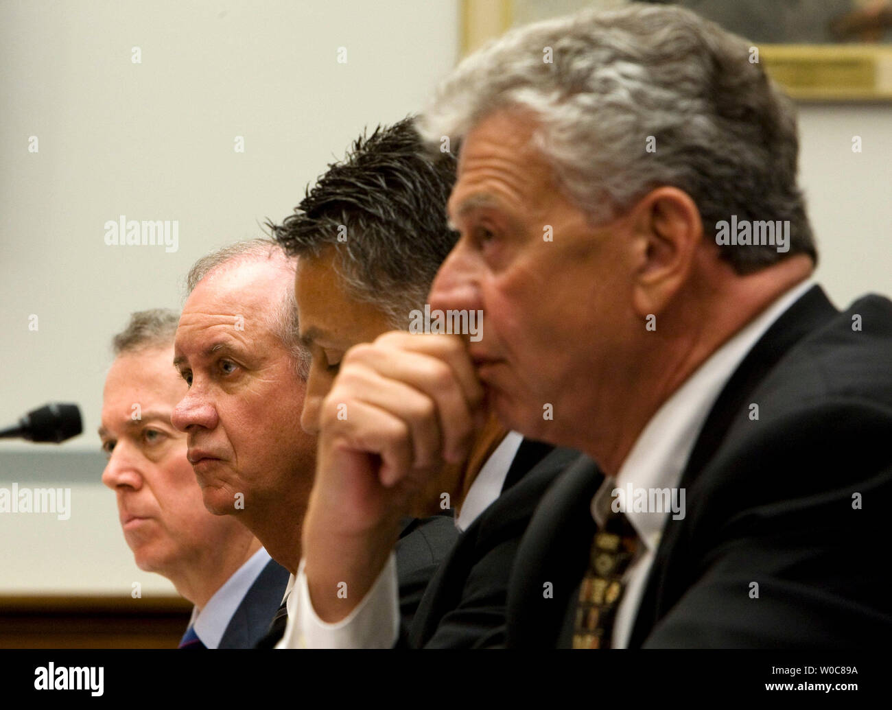 (L to R) Jim Shea, president of Gulf Stream Coach, Inc., Steve Bennet, president of Pilgrim International, Inc., Ronald Fenech, president of Keystone RV, Inc., and Peter Liegl, president and CEO of Forest River, Inc. are sworn in before testifying before a House Oversight and Government Reform Committee hearing on the manufacturers of FEMA (Federal Emergency Management Agency) trailers and elevated formaldehyde levels found in the trailers provided to the victims of the Gulf Coast hurricanes of 2005 on Capitol Hill in Washington on July 9, 2008. (UPI Photo/Patrick D. McDermott) Stock Photo