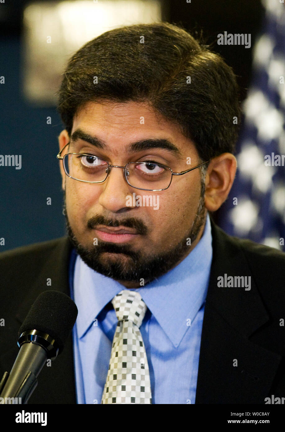 Akif Rahman speaks during a news conference held by the American Civil Liberties Union (ACLU) to mark the one millionth addition to the Transportation Security Administration's terrorist watch list at the National Press Club in Washington on July 14, 2008. Rahman, an American citizen, has been repeatedly detained and interrogated extensively at the U.S.-Canada border while traveling for business. (UPI Photo/Patrick D. McDermott) Stock Photo