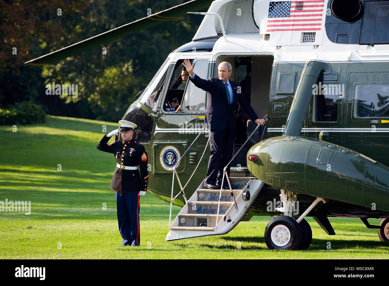 U.S. President George W. Bush waves as he boards Marine One on the South Lawn of the White House in Washington on August 15, 2008. President Bush is traveling to his ranch in Crawford, Texas. (UPI Photo/Patrick D. McDermott) Stock Photo