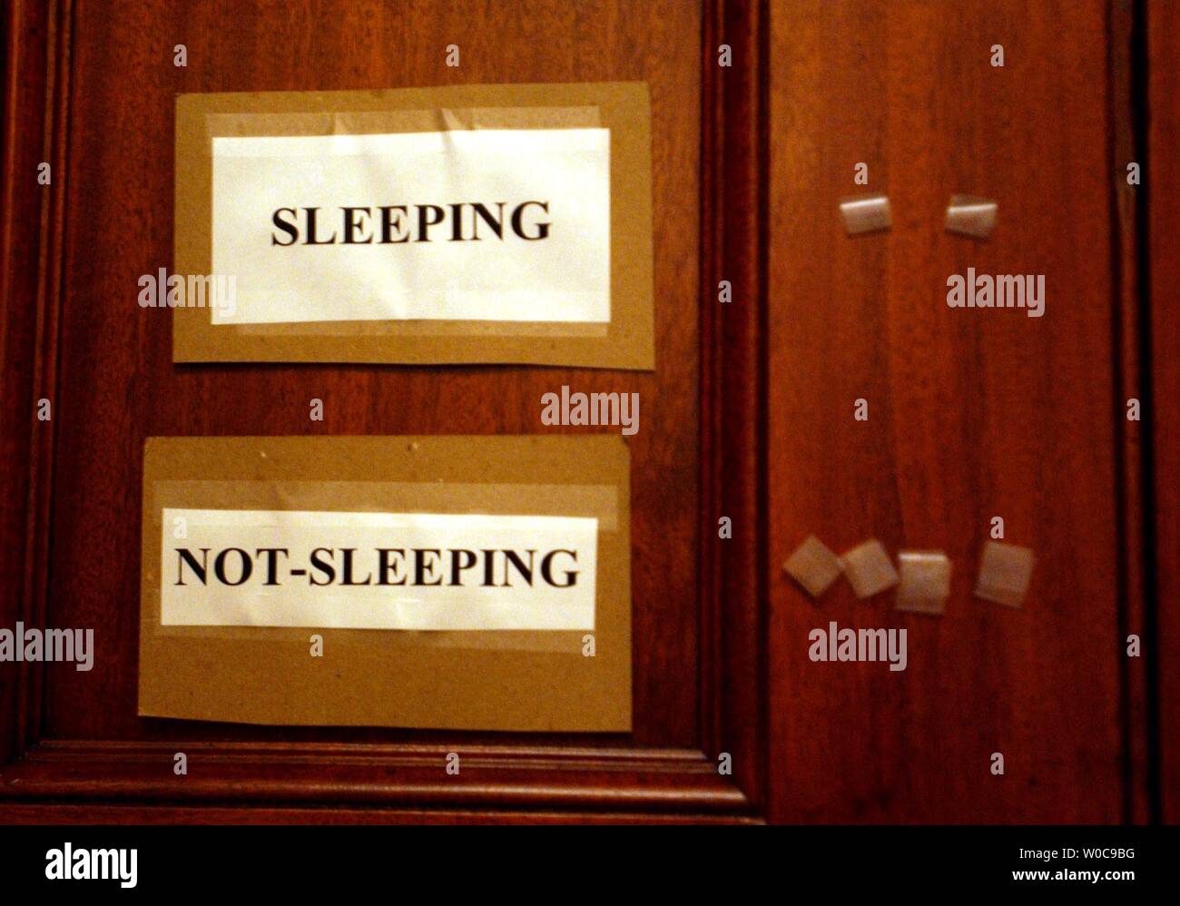 Signs designate if Senators are sleeping on cots in the Capitol Building on November 13, 2003 in Washington.  Republicans have called for a thirty some odd 'filibuster' in protest of the Democrats refusal to push through several judicial nominees.  (UPI/Michael Kleinfeld) Stock Photo