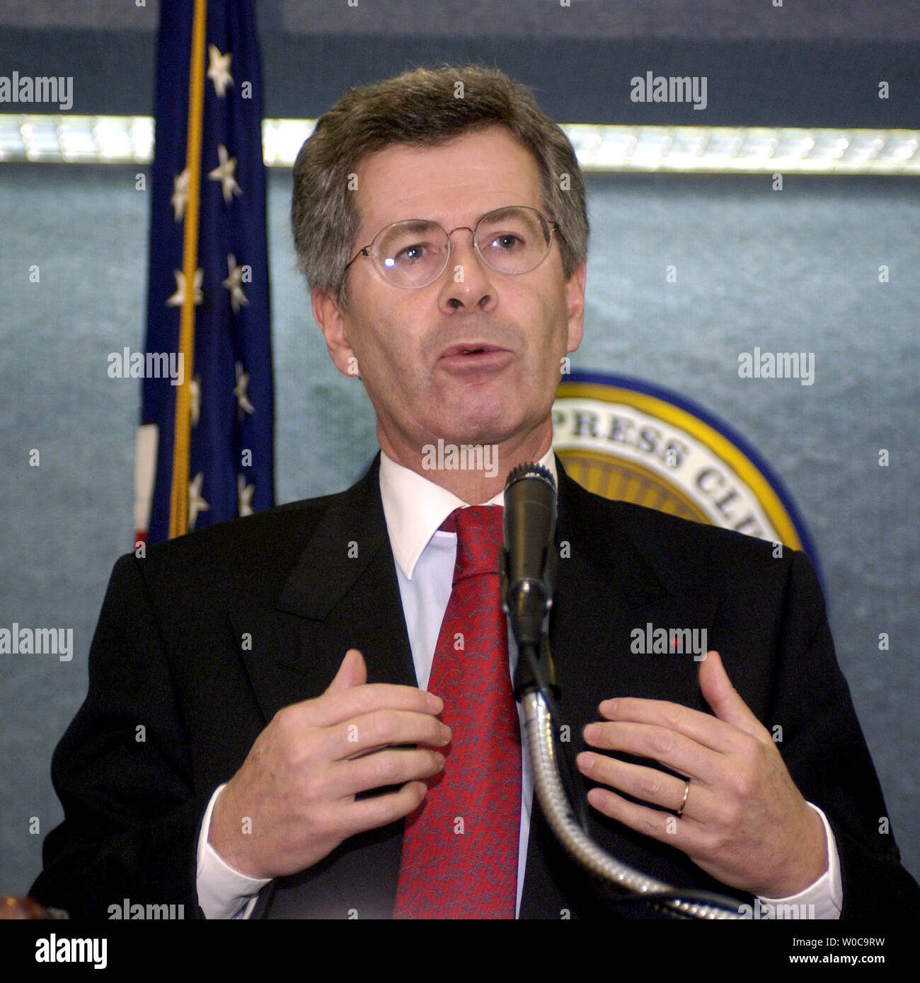 French Ambassador to the United States Jean David Levitte under scores the importance of Trans-Atlantic communication and relationships for younger peoples, during the anouncement of a new program between the United States, France and Germany at the National Press Club on December 12, 2003 in Washington.  Both gentlemen tried to avoid questions regarding the decision by the United States to keep companies from their countries from gaining  contracts in Iraq. (UPI Photo/Michael Kleinfeld) Stock Photo