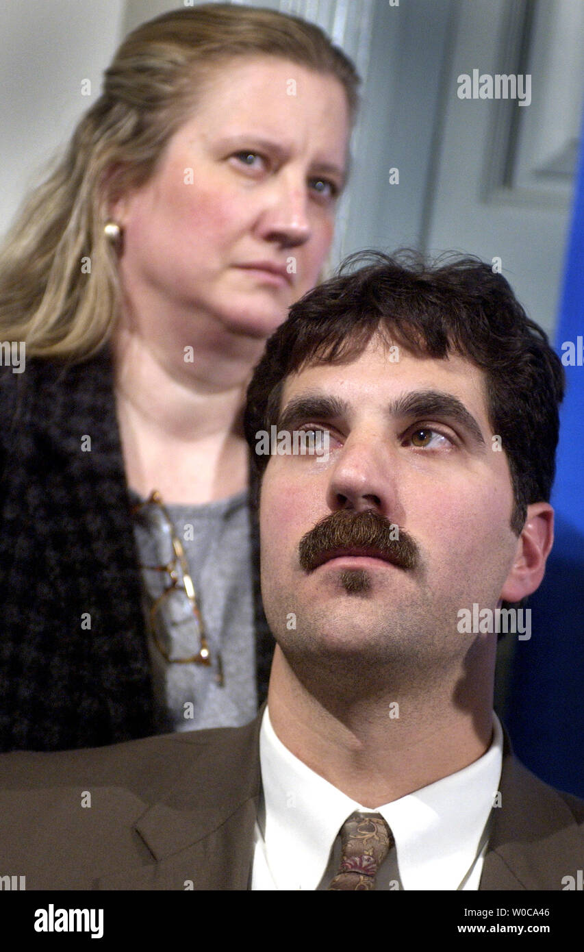 George Pauley, a Consumer Safety Inspector for the U.S. Department of Agriculture, right, and Felecia Nestor, Food Safety Program Director for the Government Accountablility Project, answer reporters questions at a news conference on January 15, 2004 in Washington.  Pauley and several others claim that the Department of Agriculture methods and screen protocols for mad cow disease are almost insufficient, and in some cases non existent.      (UPI Photo/Michael Kleinfeld) Stock Photo