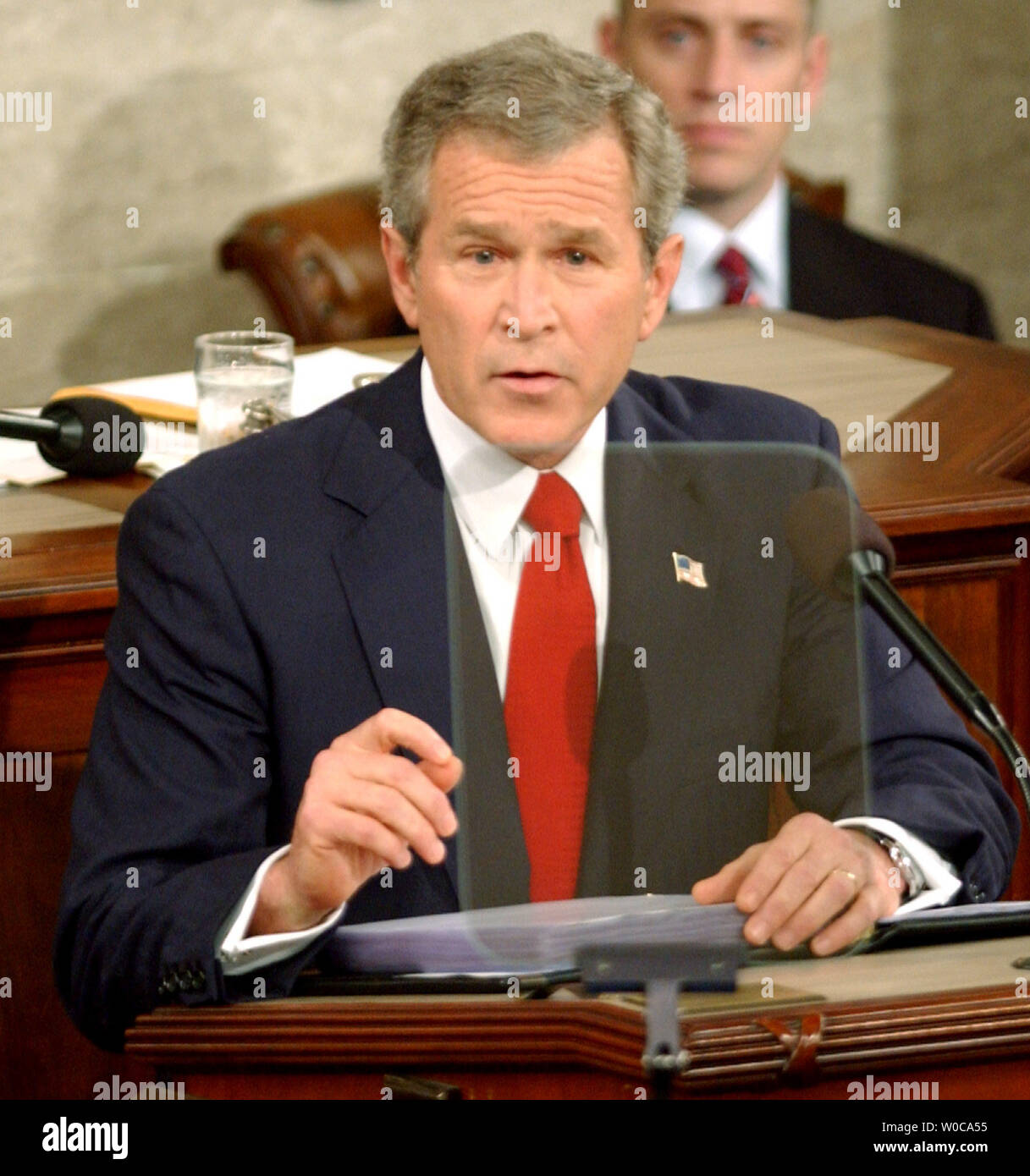 President George W. Bush delivers his State of the Union Speech on January 20, 2004, on Capitol Hill in Washington. Bush spoke about the war on terrorism, the ongoing efforts in Iraq and Afghanistan, how to help the economy and the need for better, more readily available health insurance.    (UPI Photo/Michael Kleinfeld) Stock Photo