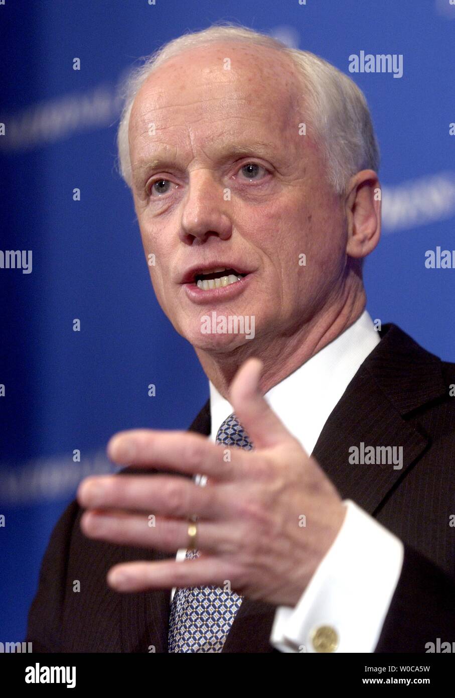 Former Governor Frank Keating, who is now the President and CEO of the American Council of the Life Insurers speaks at the National Press Club on January 20, 2004 in Washington.  Keating discussed the impending problems of America's baby boomers who are not saving enough, and the ramifications that will have on the country. (UPI Photo/Michael Kleinfeld) Stock Photo