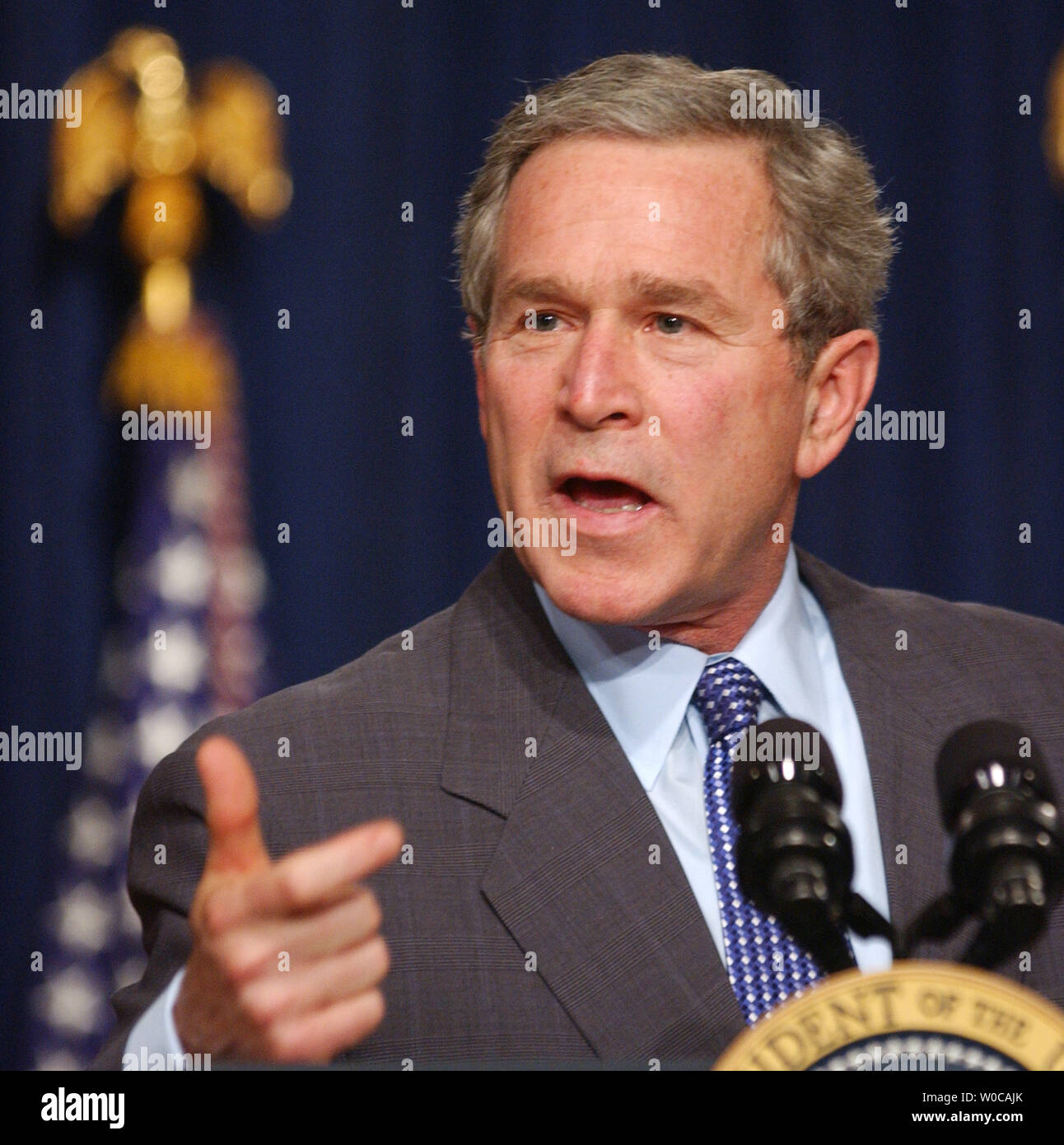 President George W. Bush addresses those gathered in the Old Executive Office Building regarding the U.S. economy and the issue of jobs in America on February 19, 2004 in Washington.     (UPI Photo/Michael Kleinfeld) Stock Photo