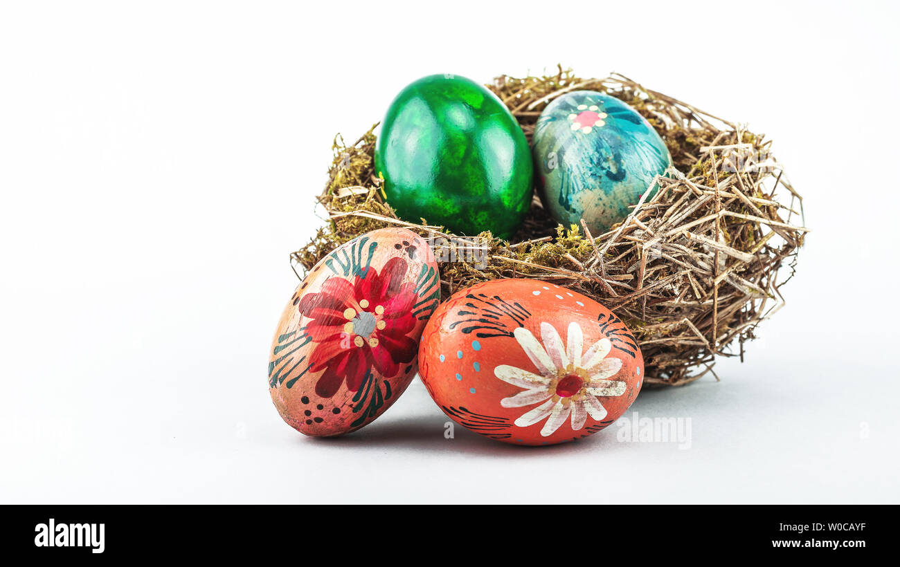 Old Easter eggs in bird nest isolated on a white background Stock Photo ...