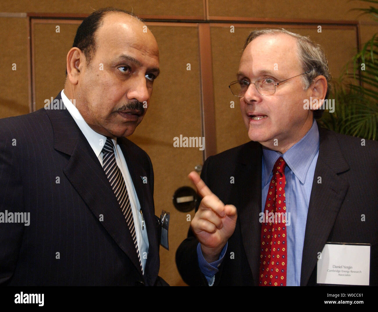 Abdallah Jum'ah, CEO of Saudi Aramco, left, speaks with Daniel Yergin, Chairman of the Cambridge Energy Research Assoc., during a conference on the United States and Saudi Arabia relationship and their interests in energy security, on April 27, 2004 in Washington.  The conference was sponsored by CSIS and dealt with oil reserves, production, prices and security. (UPI Photo/Michael Kleinfeld) Stock Photo