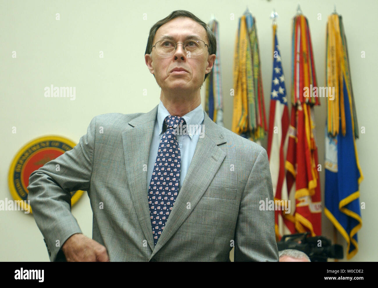 David Chu, Under Secretary of Defense, waits for the House Armed Services Committee to start its hearing on July 7, 2004 in Washington.  The Committee is looking into troop size and strength abroad as well as the readyness of the Reserve at home. (UPI Photo/Michael Kleinfeld) Stock Photo