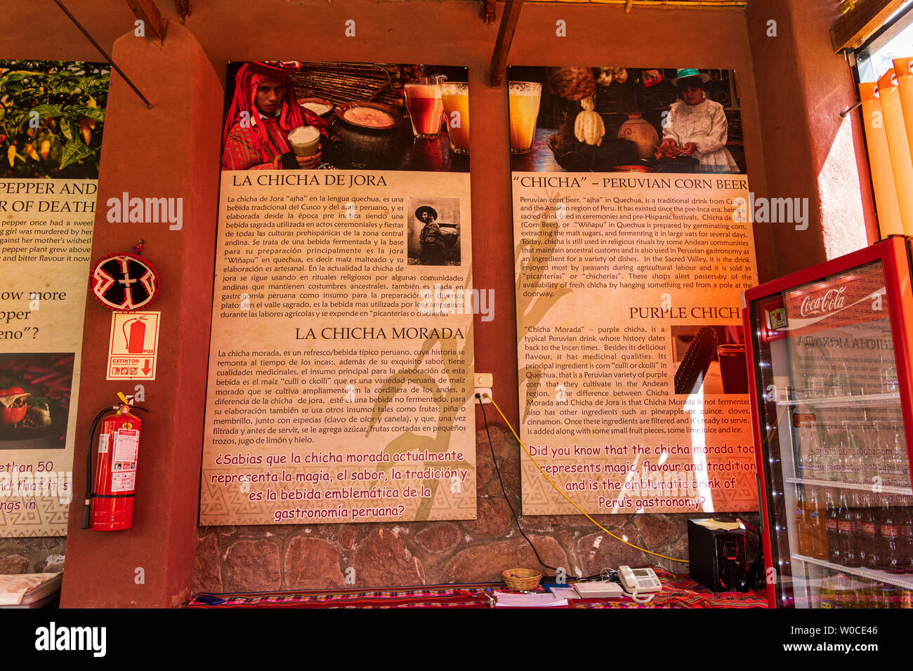 Signs explaining local dishes in English and Spanish, Parwa Community